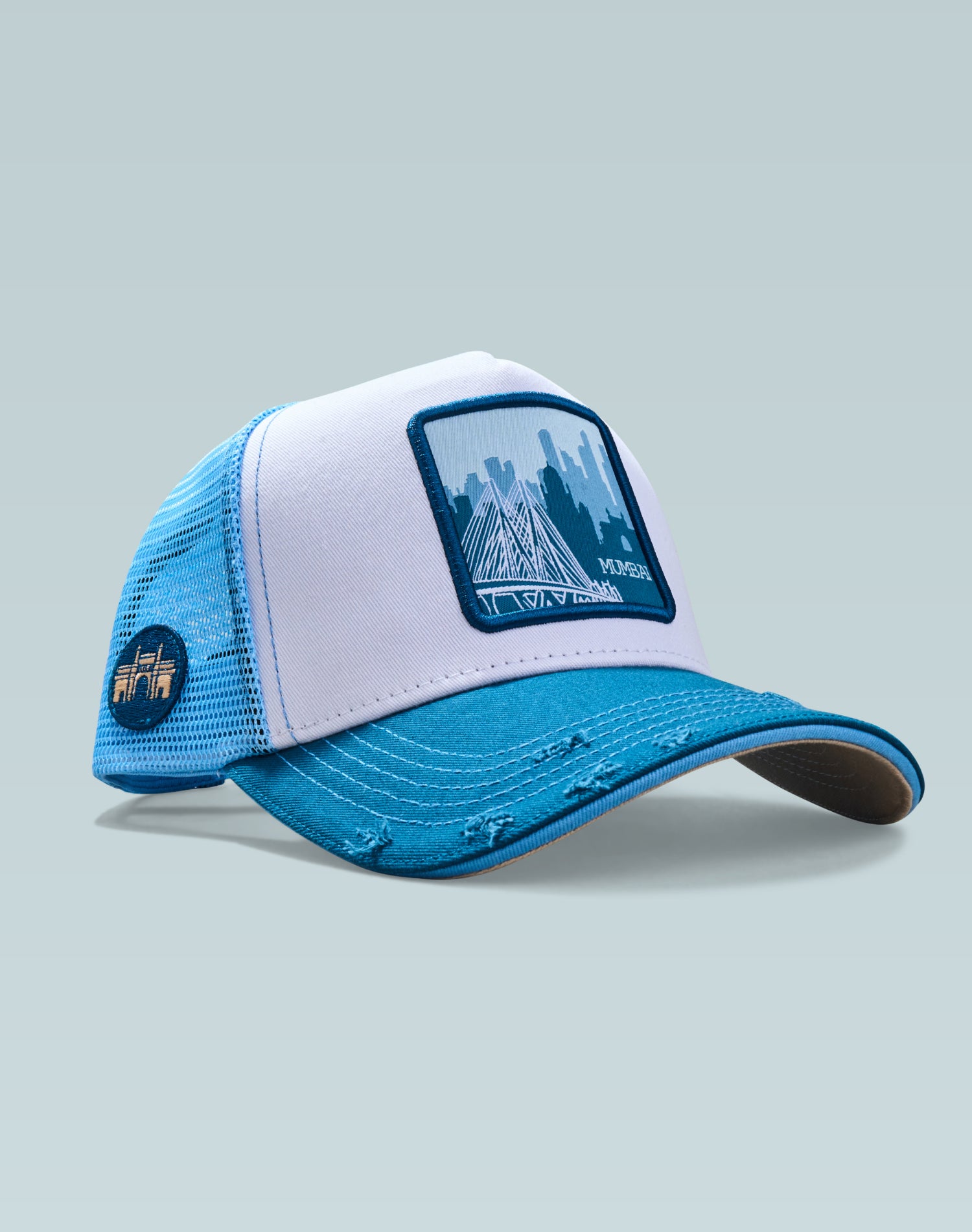 The City of Dreams White and Blue Cotton Trucker Cap